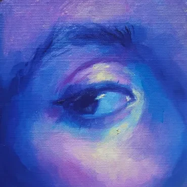 Close-up study of an eye in blue and violet tones
